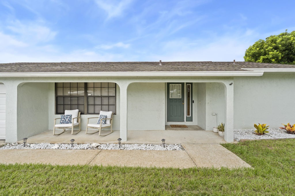 Photo of 3474 NE Sandra Drive, Jensen Beach, FL 34957 (MLS # B26078220)