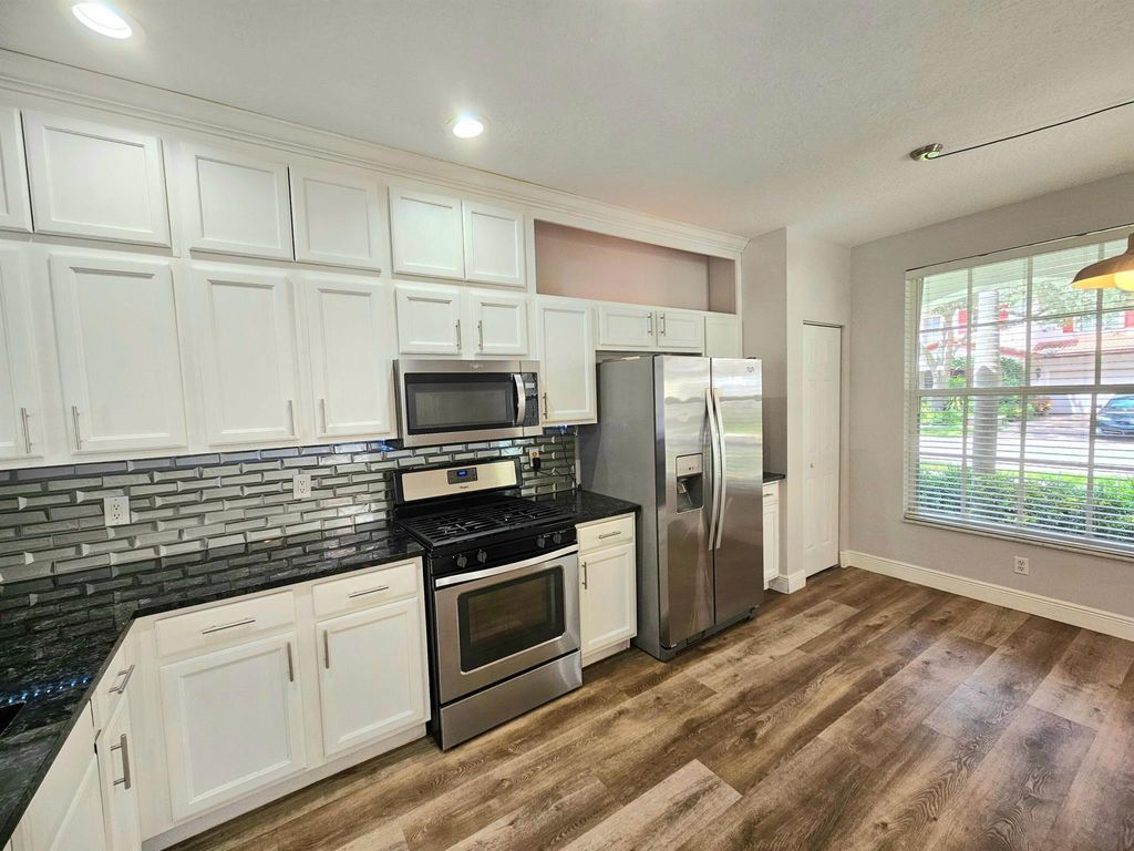 Photo of 318 September Street, Palm Beach Gardens, FL 33410 (MLS # R11122824)