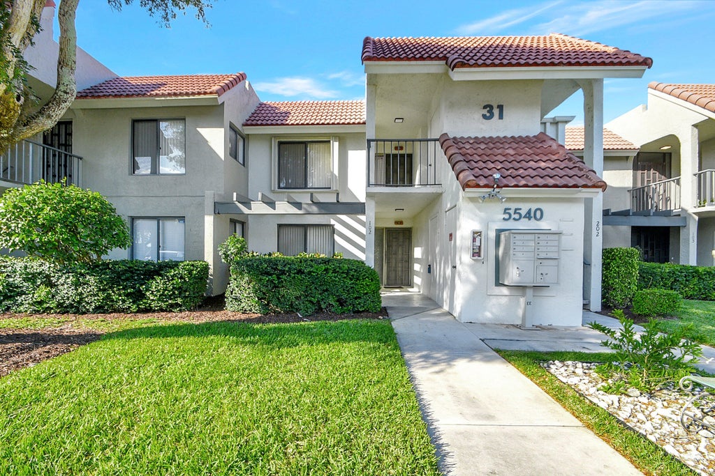 Photo of 5540 Fairway Park Drive #102, Boynton Beach, FL 33437 (MLS # R10956396)