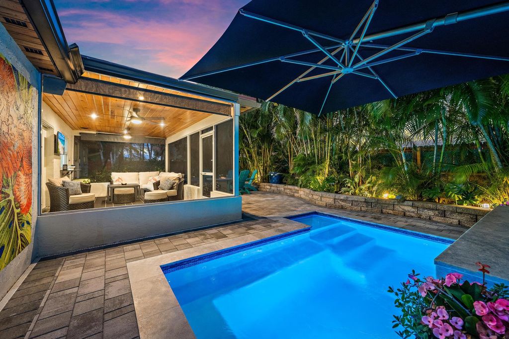 Photo of 104 Elsa Road, Jupiter, FL 33477 (MLS # B26021898)
