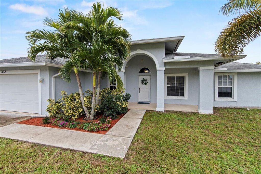 Photo of 1058 SW Aswan Avenue, Port Saint Lucie, FL 34953 (MLS # R10958783)