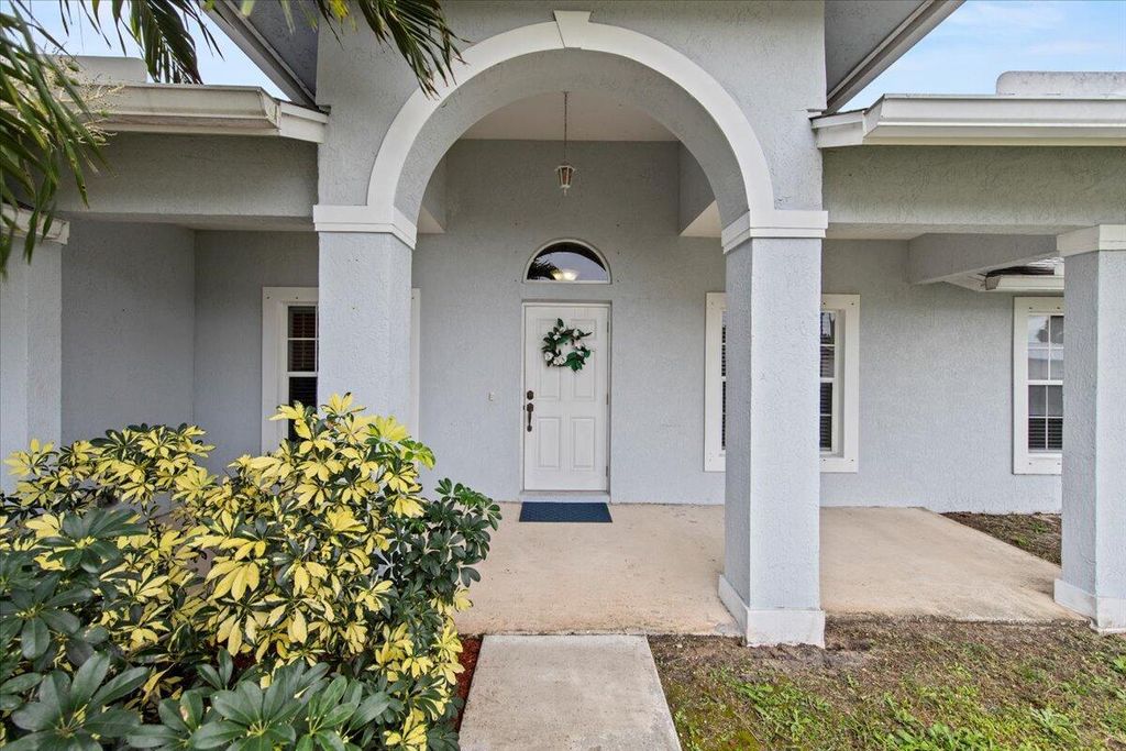 Photo of 1058 SW Aswan Avenue, Port Saint Lucie, FL 34953 (MLS # R10958783)