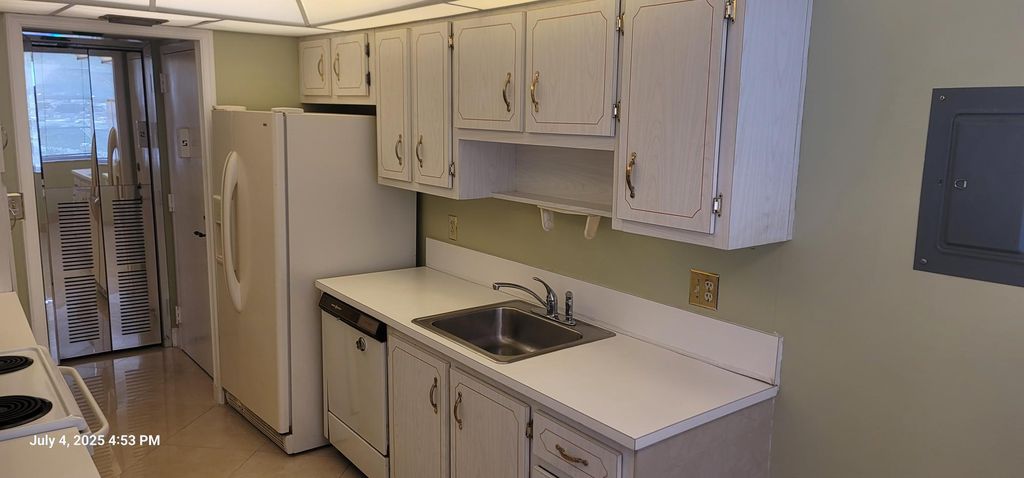 Photo of 1300 Saint Charles Place #L19, Pembroke Pines, FL 33026 (MLS # B26001841)