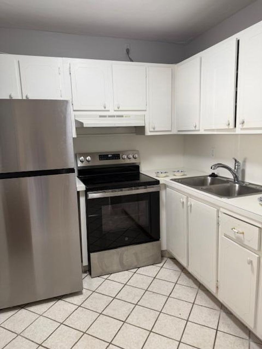 First (ground) floor unit with lake view from patio/Florida room Tile floors, new a/c new appliances, new bathroom with marble tiles and walk in shower. new vanity. Building 2 is close to amenities and lake. Enjoy Low maintenance fee includes cable and Wi-Fi. and reserves.