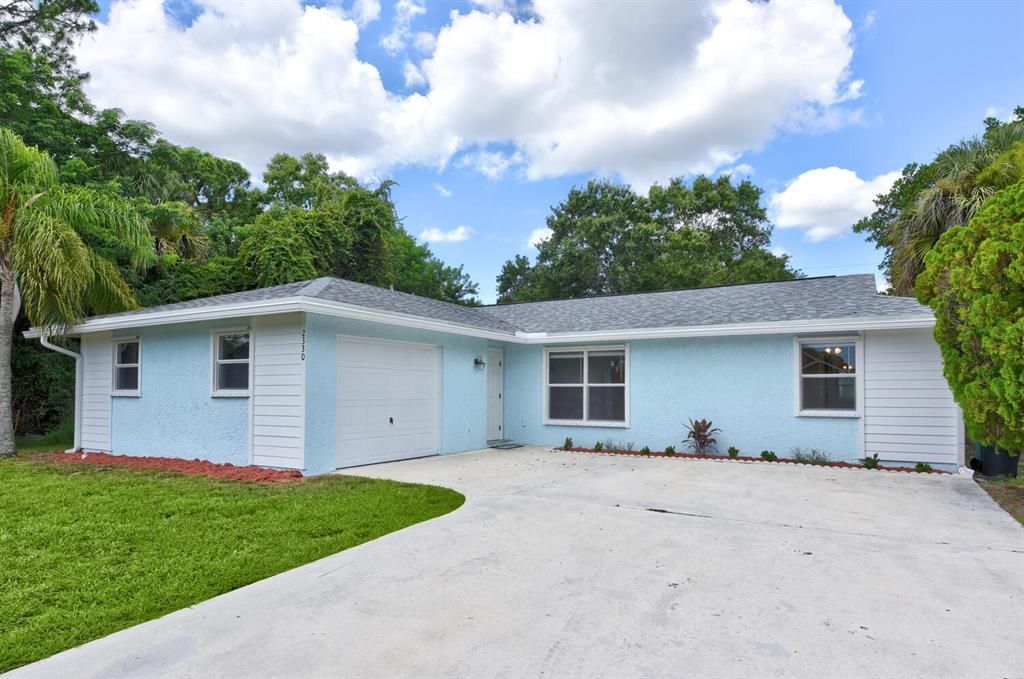 Photo of 2330 SW Lejune Street St, Port Saint Lucie, FL 34953 (MLS # R10822374)