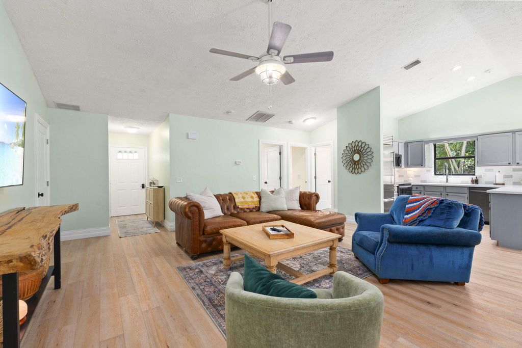 Photo of 1904 NE Avenida Dracaena, Jensen Beach, FL 34957 (MLS # B26010330)