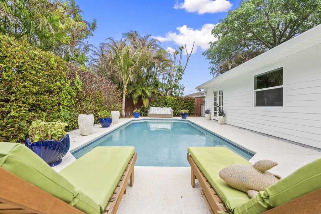 Photo of 1904 NE Avenida Dracaena, Jensen Beach, FL 34957 (MLS # B26010330)