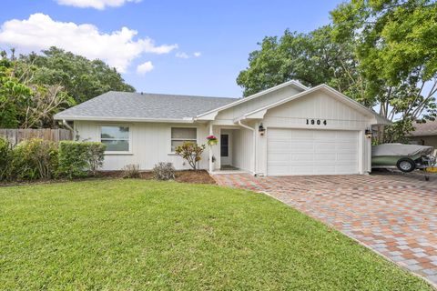 Photo of 1904 NE Avenida Dracaena, Jensen Beach, FL 34957 (MLS # B26010330)