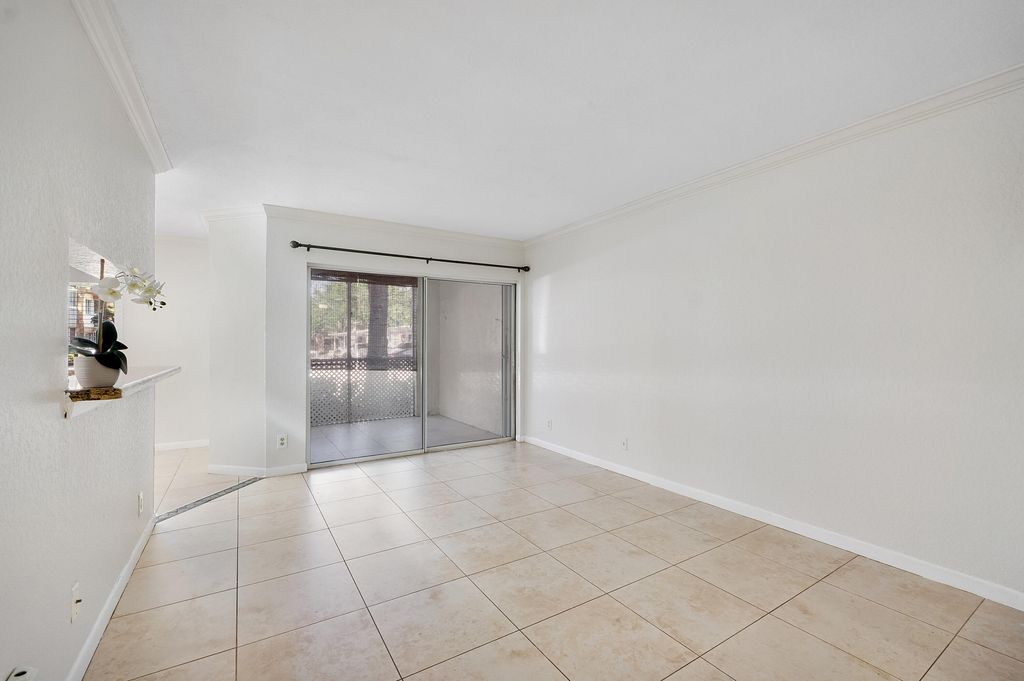 Photo of 9777 Westview Drive #1112, Coral Springs, FL 33076 (MLS # B26025453)