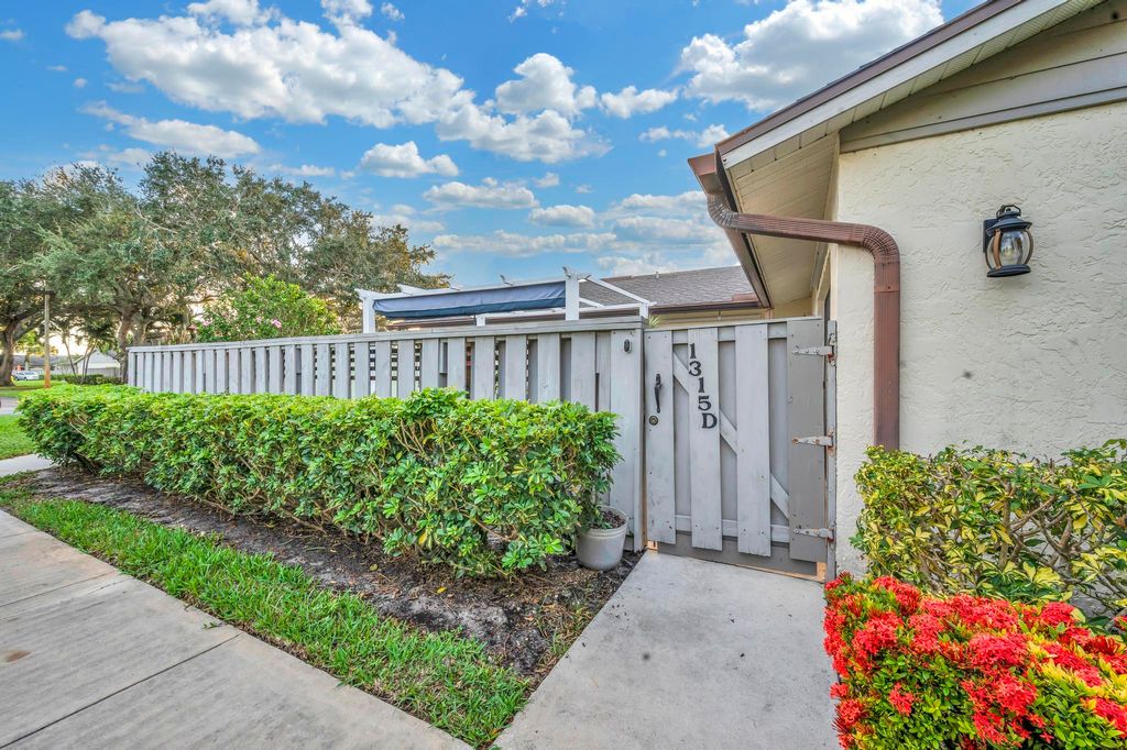 Photo of 1315 Peppertree Trail #D, Fort Pierce, FL 34950 (MLS # R10980253)