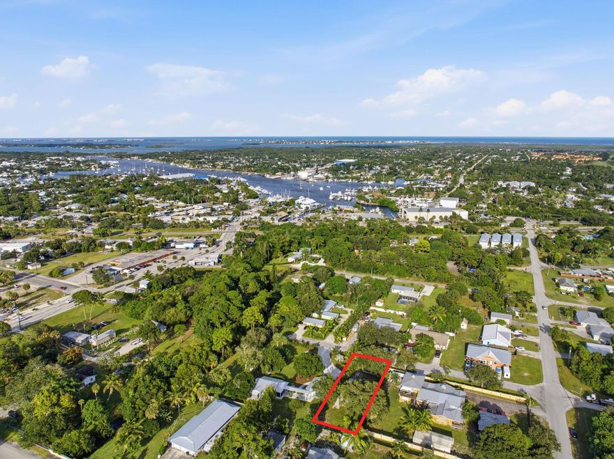 Located just minutes from the Manatee Pocket's marinas and waterfront activities, this vacant lot offers an appealing blend of location and lifestyle. Enjoy close proximity to elevated waterfront dining and the creative energy of neighborhood art studios and galleries. A nearby marina and public boat ramp provide convenient options for getting on the water, while additional shoreline access points make paddleboarding, fishing, and outdoor leisure effortlessly within reach. No HOA. A standout opportunity to own land in one of Martin County's desirable coastal communities.