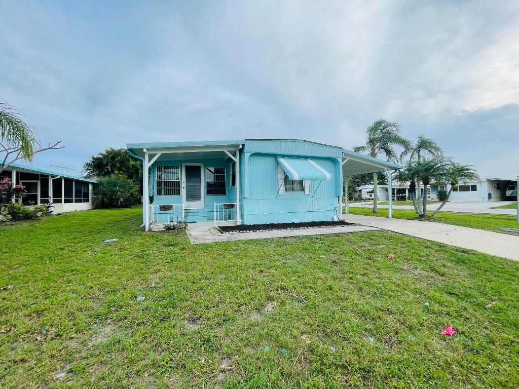 Photo of 7108 SE Seahawk Street, Hobe Sound, FL 33455 (MLS # R10954276)