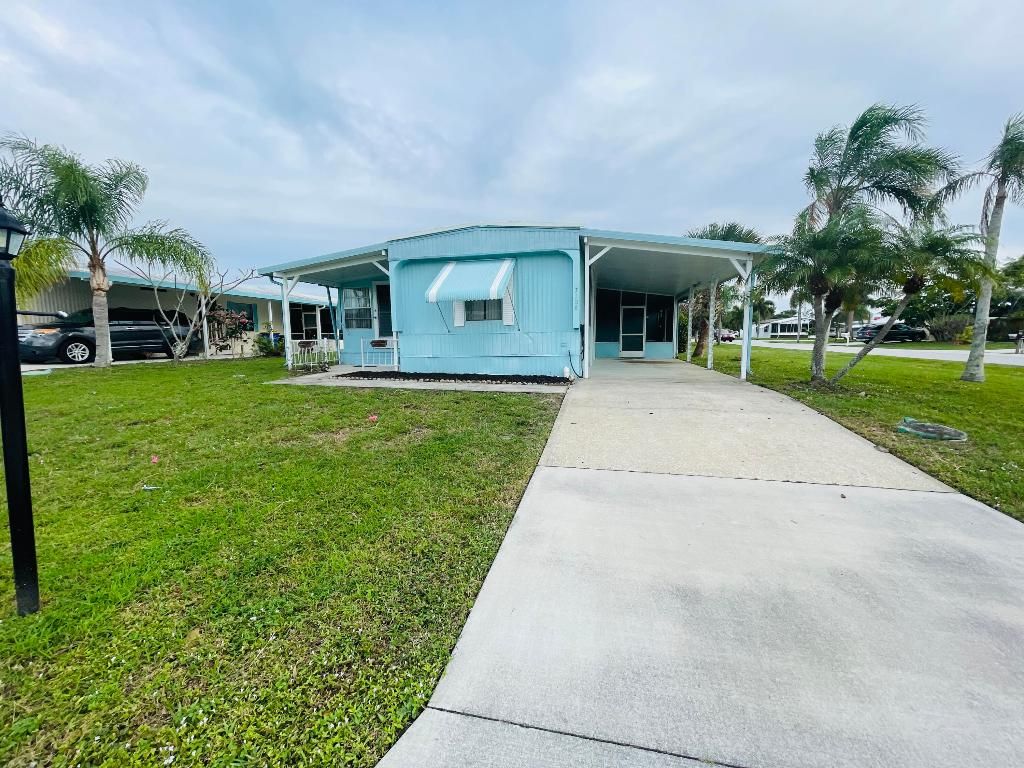 Photo of 7108 SE Seahawk Street, Hobe Sound, FL 33455 (MLS # R10954276)