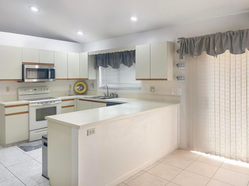 Photo of 9525 El Clair Ranch Road, Boynton Beach, FL 33437 (MLS # R11167767)