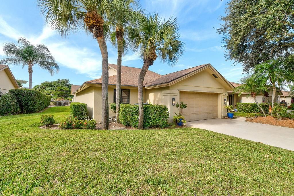Photo of 112 Sand Pine Drive, Jupiter, FL 33477 (MLS # R10877913)