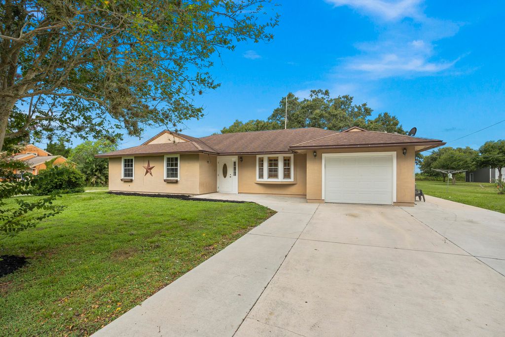 Photo of 1785 Cody Lane Ln, Fort Pierce, FL 34945 (MLS # R10817701)