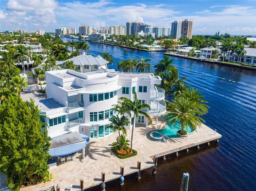 ***OVER $250,000 PRICE REDUCTION***LIKE NEW!! SPECTACULAR SE INTRACOASTAL POINT ESTATE IN FT. LAUDERDALE, THE YACHTING CAPITAL OF THE WORLD!!!!BREATHTAKING INTRACOASTAL VIEWS FROM ALL ROOMS, SMART HOME TECHNOLOGY, CAMERAS, MEDIA RM, SOARING CEILINGS, ELEVATOR, WHITE MARBLE FLRS, GRAND MASTER SUITE W/STNG AREA&LUXURIOUS BATH, FABULOUS SALT WATER POOL& SPA, GAZEBO, SHADES, SUMMER KITCHEN, LUSH TROPICAL LANDSCAPING&LIGHTING.