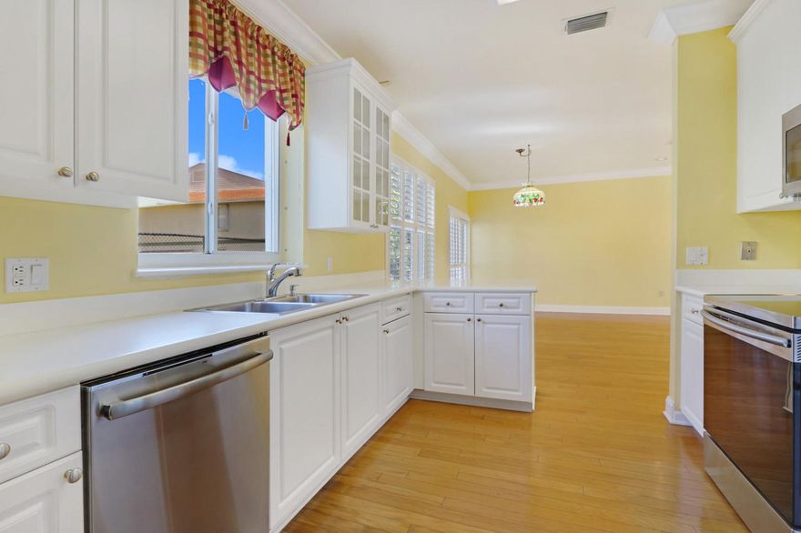 Fantastic central location and only minutes from pristine beaches, restaurants, shopping, Abacoa and The  Gardens mall. This beautiful turnkey townhouse in Laurel Oaks includes a community pool which is just steps away from your front door. Spacious 2 bedrooms with en suite bathrooms, 2.5 baths, gorgeous hardwood floors, updated kitchen with stainless steel appliances, Walk-in closets, fenced in backyard, Great school district! Close to 95 and the turnpike. Live the Jupiter lifestyle with Palm Beach Gardens seconds away.  Great place to call home!