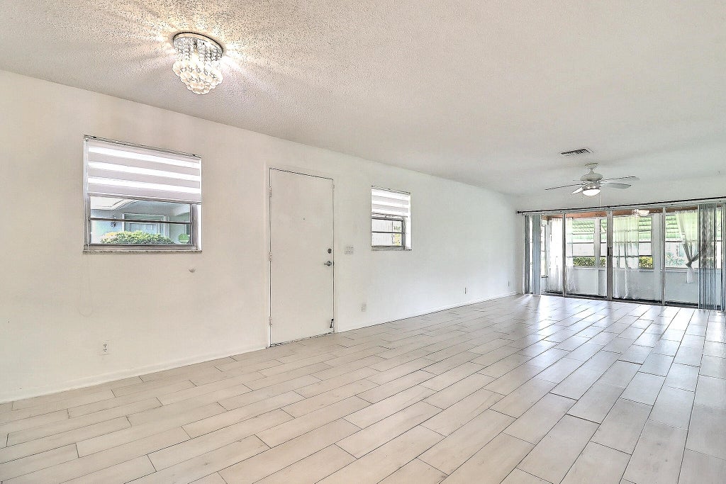 Photo of 450 BLUEBIRD Lane, Delray Beach, FL 33445 (MLS # B26081866)