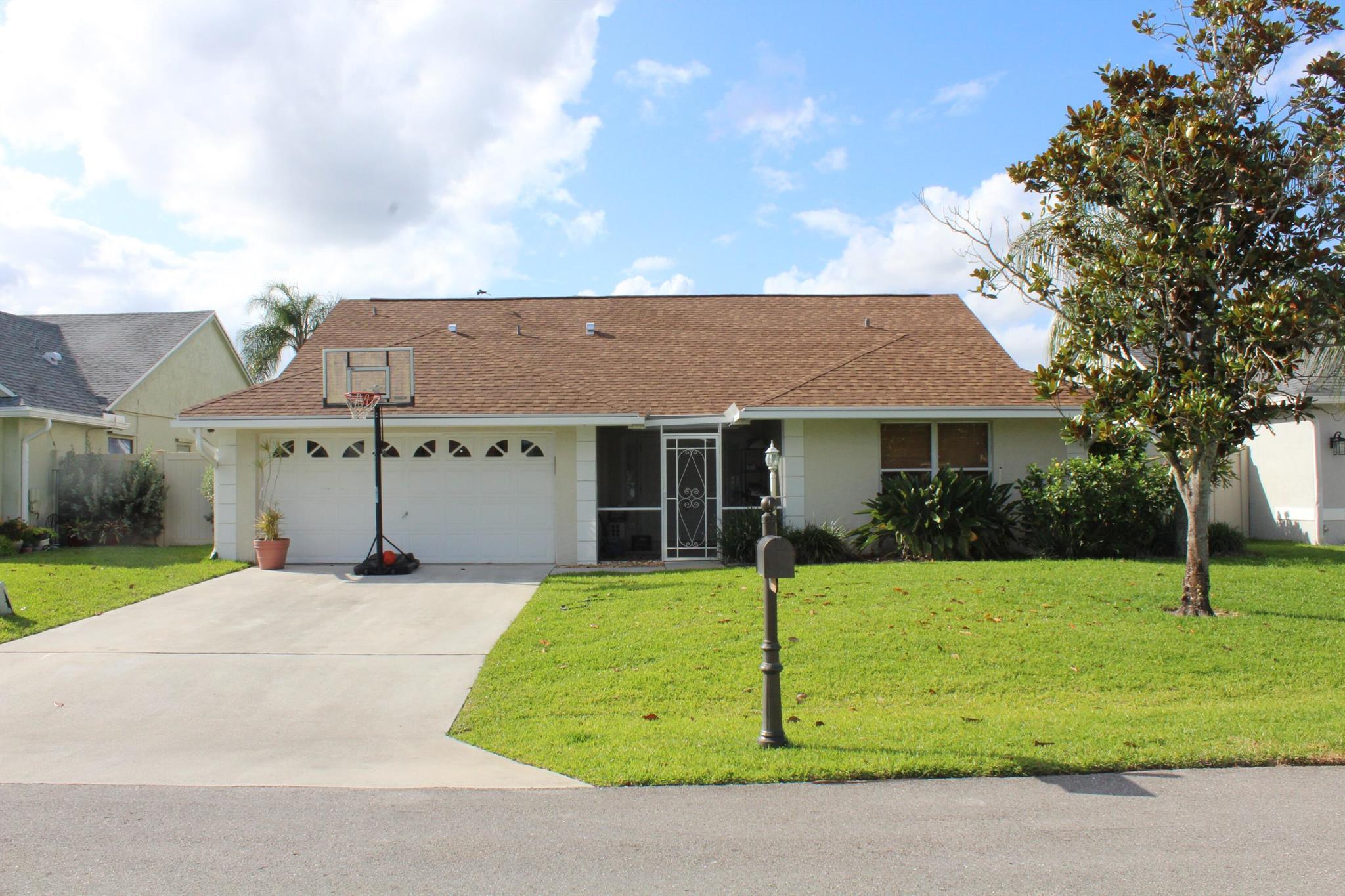 Beautiful single-family home in the sought-after Wellington community of Meadowland Cove. Home has a 3-bedroom split floor plan, fenced backyard with artificial turf and a putting green, upgraded kitchen and renovated bathrooms. Newer AC and new roof installed in 2024, all tile flooring throughout the home. Newer appliances. Large open living room and kitchen. Community amenities include a heated Olympic size pool on the lake with community center and picnic area. Zoned for all A rated schools: Wellington Elementary, Wellington Landings and Wellington High School. Close to shopping, restaurants and the Equestrian show grounds.
