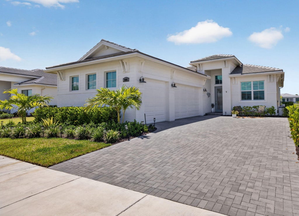 Photo of 8605 SW CANTANTE Way, Port Saint Lucie, FL 34987 (MLS # B26066277)