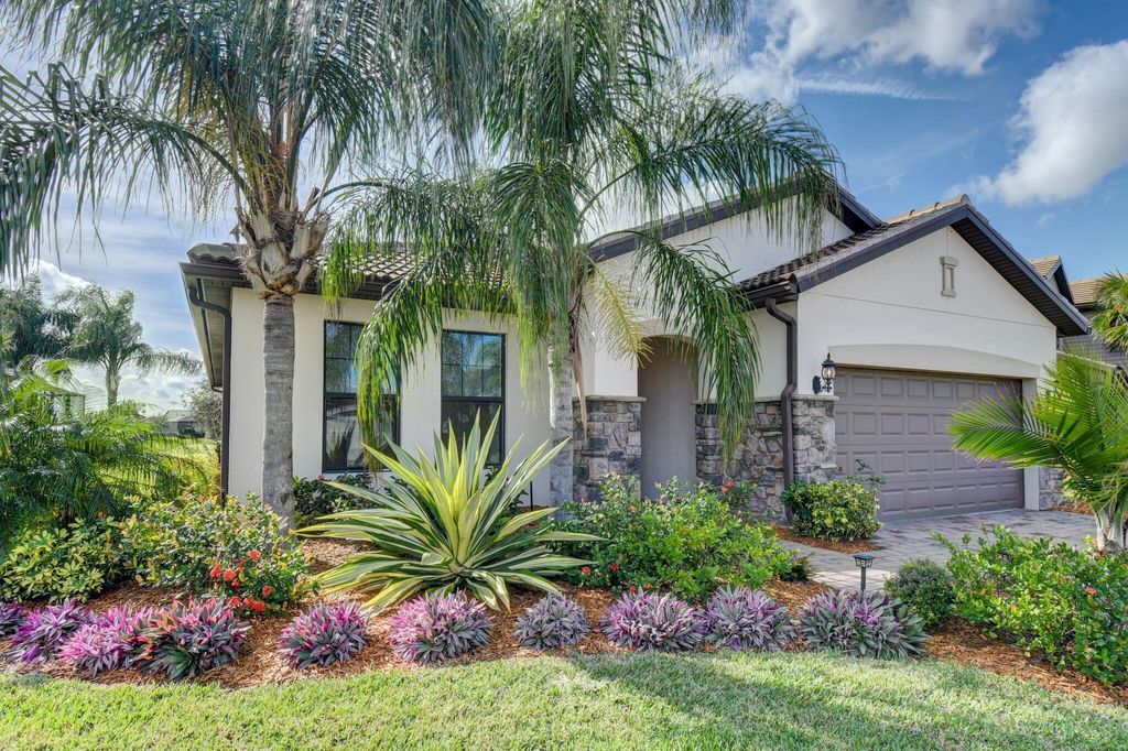 Photo of 120 SE Courances Drive, Port Saint Lucie, FL 34984 (MLS # R10946168)