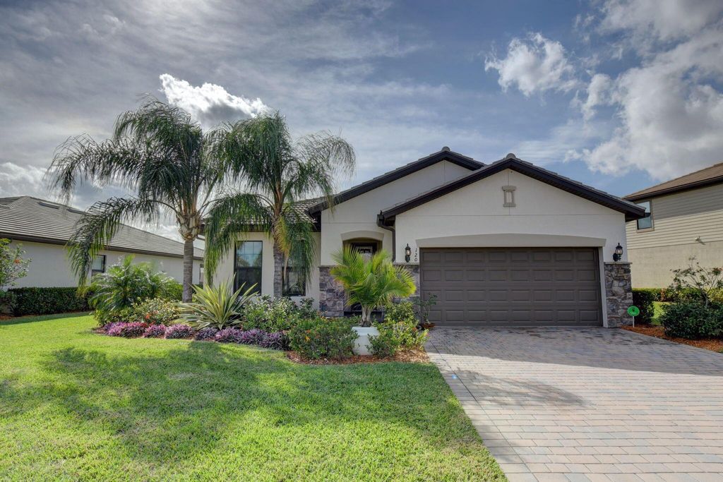 Photo of 120 SE Courances Drive, Port Saint Lucie, FL 34984 (MLS # R10946168)