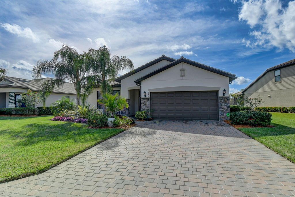 Photo of 120 SE Courances Drive, Port Saint Lucie, FL 34984 (MLS # R10946168)