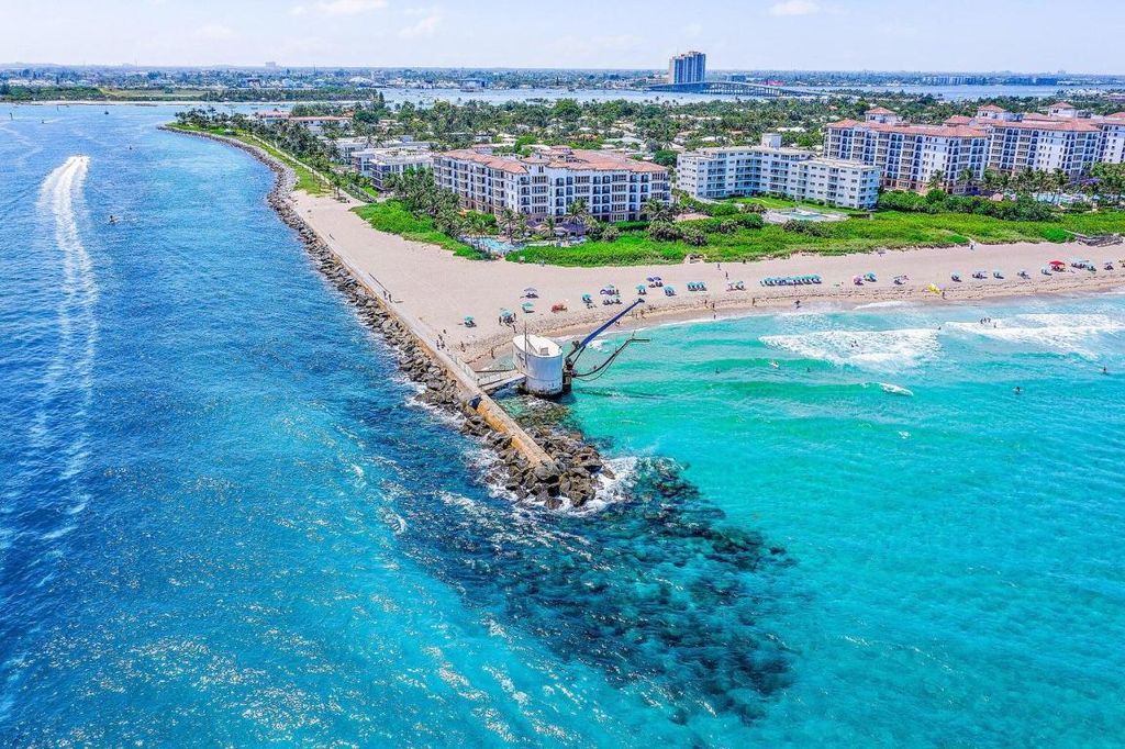 Photo of 217 Blossom Lane, Palm Beach Shores, FL 33404 (MLS # R11001943)