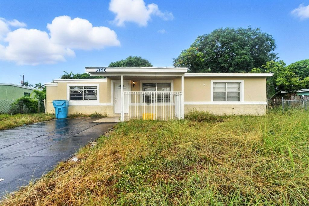 Photo of 3196 N Seacrest Boulevard, Boynton Beach, FL 33435 (MLS # F10520085)