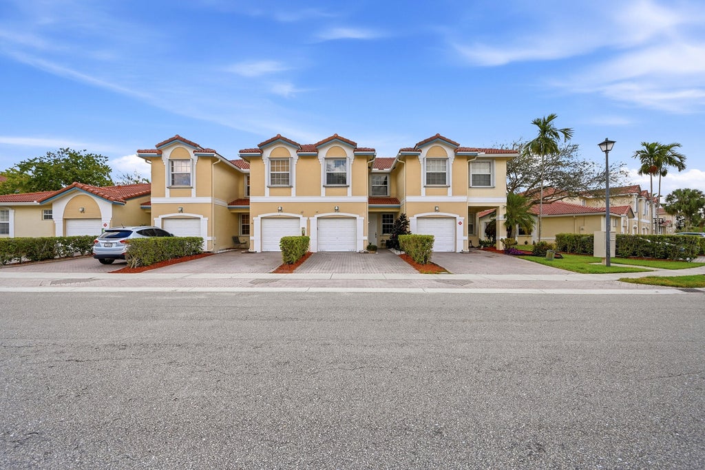 Photo of 11722 NW 47th Drive, Coral Springs, FL 33076 (MLS # B26001323)