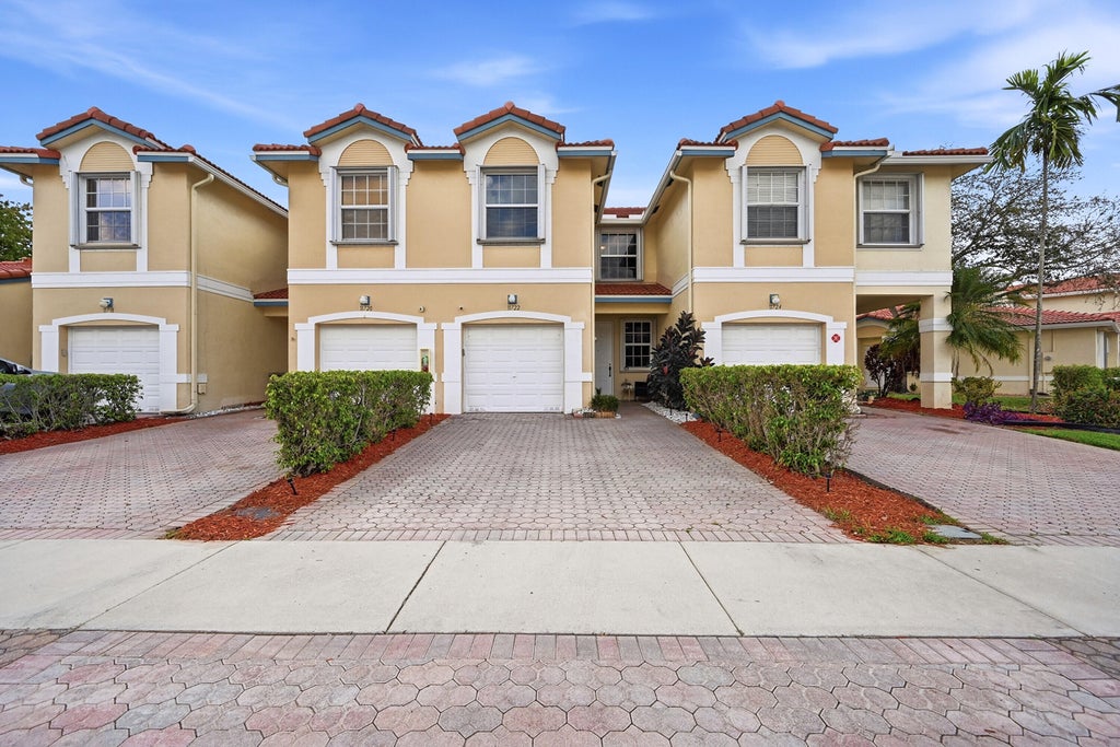 Photo of 11722 NW 47th Drive, Coral Springs, FL 33076 (MLS # B26001323)