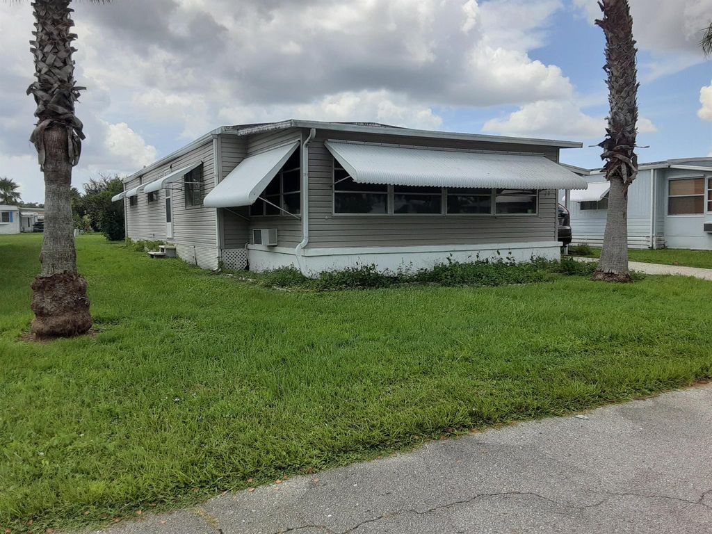 Photo of 79 El Camino Real Real, Port St Lucie, FL 34952 (MLS # R10912940)