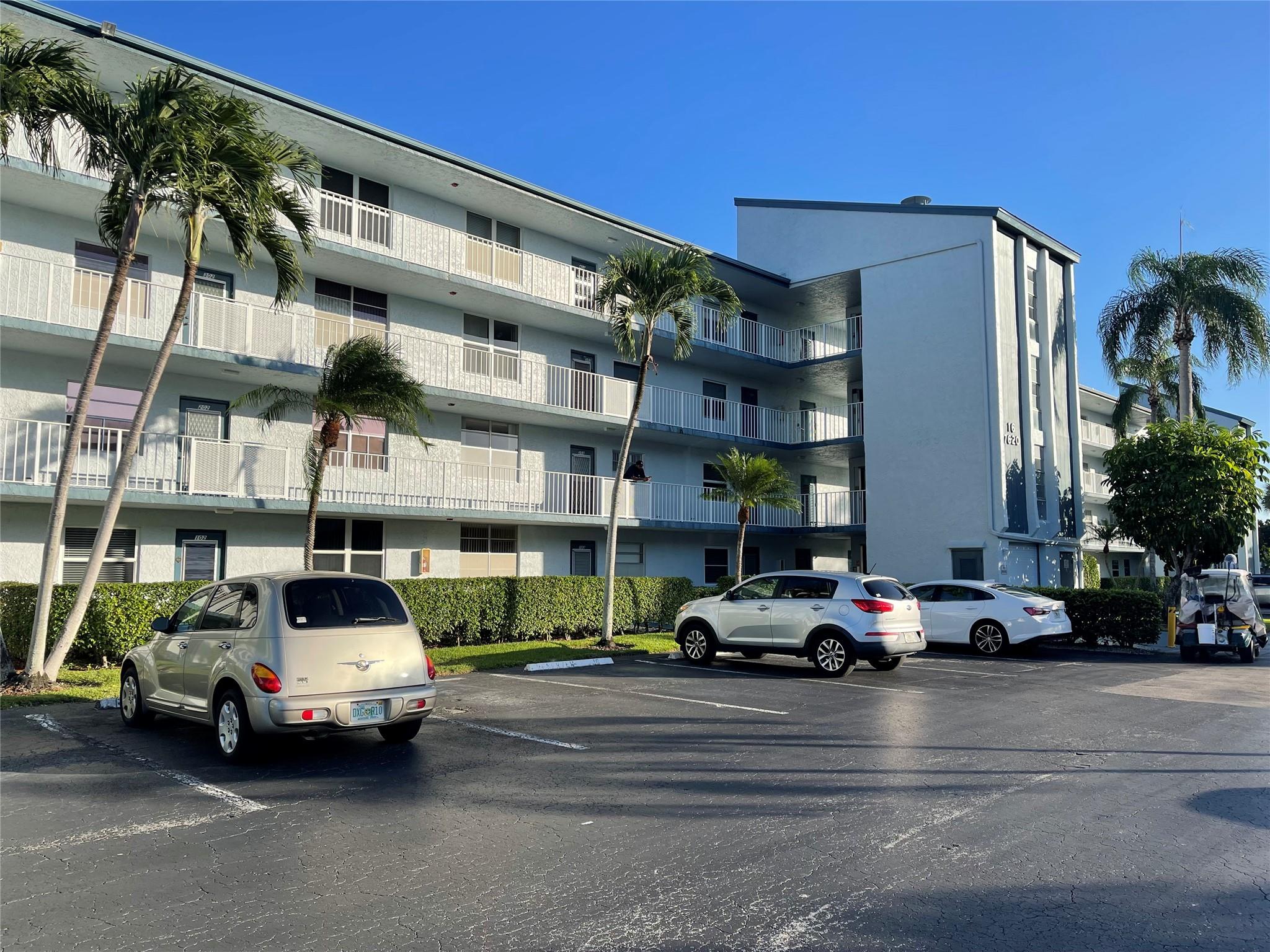 Spacious 2/2 condo in the desirable 55+ community of Palm Springs II in Margate. Features include new flooring, stainless steel appliances, impact windows, and an enclosed Florida room with serene lake and golf course views. Split bedroom layout with plenty of storage. Enjoy resort-style amenities including clubhouse, heated pool, fitness center, tennis, and social activities. Conveniently located near shopping, dining, and major highways.