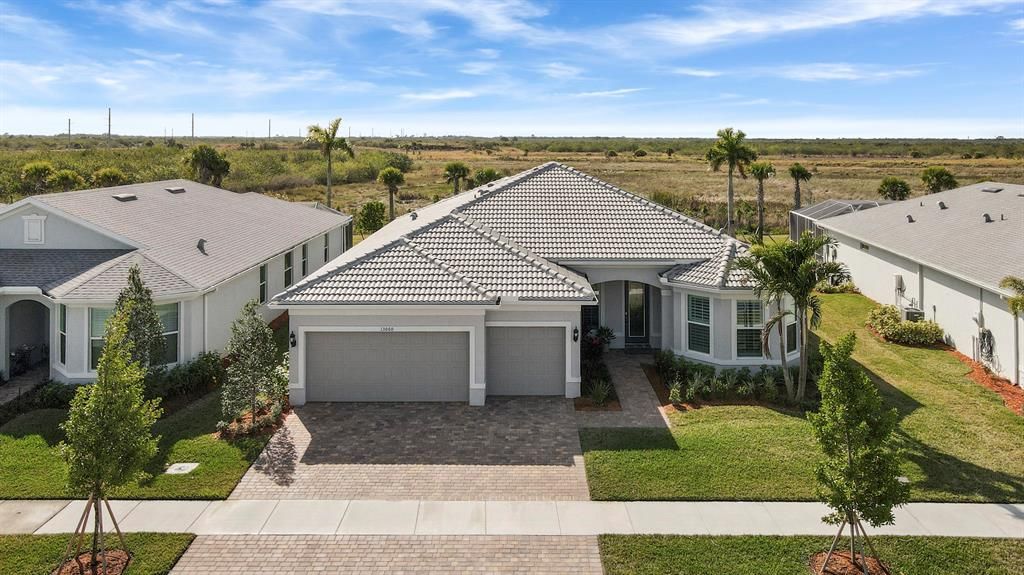 Photo of 13060 SW Aureolian Lane Ln, Port St Lucie, FL 34987 (MLS # R10689427)