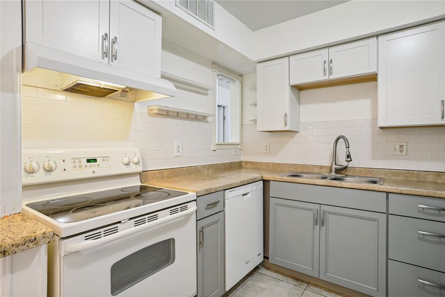 JUST REDUCED! Welcome home to this charming 1st floor corner unit condo with canal views, offering a bright living space to make you feel right at home. The interior was freshly painted (2023) and exterior in 2021, creating a clean and updated look. With accordion shutters throughout, you have peace of mind knowing that your home is protected during hurricane season. The kitchen features stylish cabinets that were installed in 2019, providing ample storage and a modern touch. Additionally, a brand-new electric panel has been installed (2023), ensuring a reliable and efficient electrical system. This condo is located within a gated community, right near Renaissance Commons, offering tons of restaurants, shopping, and more. Amenities include: pool, oversized clubhouse w kitchen, and BBQ area