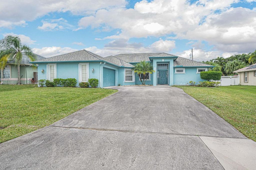 Photo of 5483 NW Empress Circle, Port Saint Lucie, FL 34983 (MLS # R10943871)