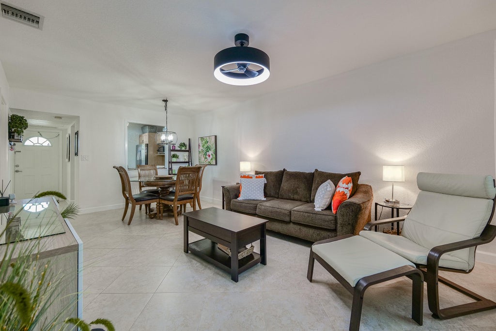 Photo of 3531 NW 50TH Avenue #413, Lauderdale Lakes, FL 33319 (MLS # B26091559)