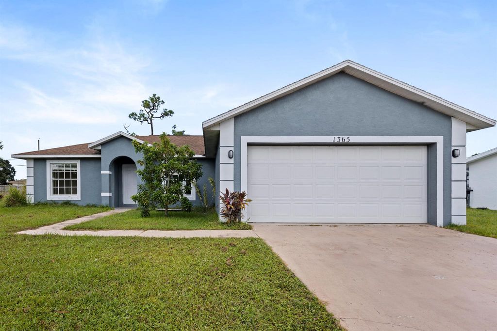 Photo of 1365 SE Odonnell Lane, Port St Lucie, FL 34983 (MLS # R10920802)