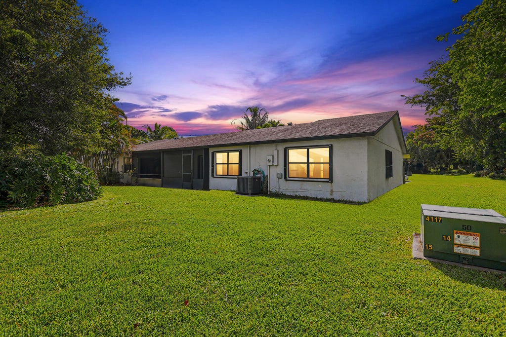 Photo of 10 Seneca Court, Royal Palm Beach, FL 33411 (MLS # B26048839)