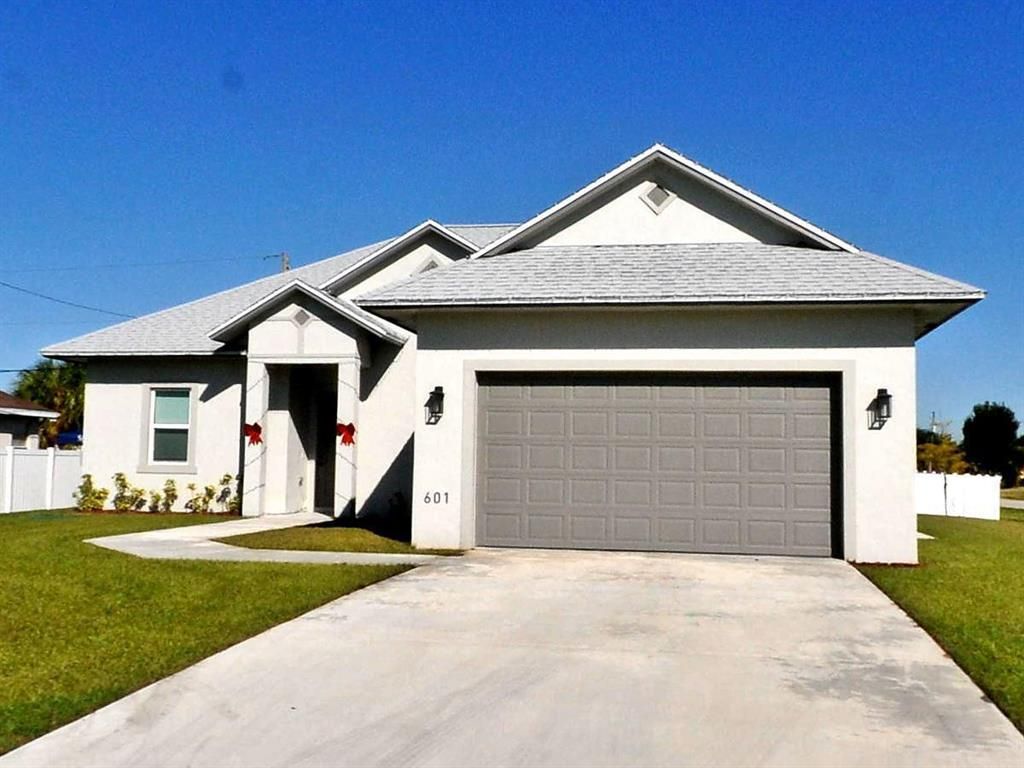 Photo of 601 SW Mchole Avenue, Port St Lucie, FL 34953 (MLS # R10897495)