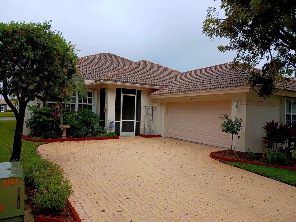 Photo of 2325 Sailfish Cove Drive, West Palm Beach, FL 33411 (MLS # B26017182)