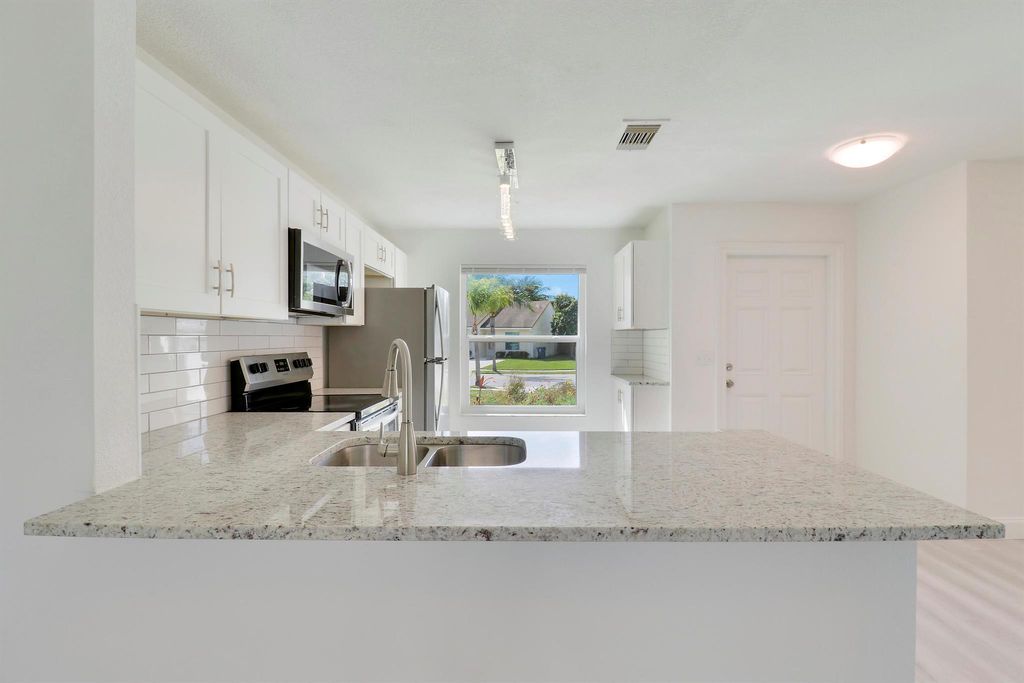 Photo of 216 Palmetto Court, Jupiter, FL 33458 (MLS # R11072287)