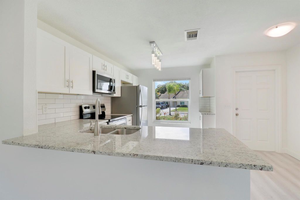Photo of 216 Palmetto Court, Jupiter, FL 33458 (MLS # R11072287)