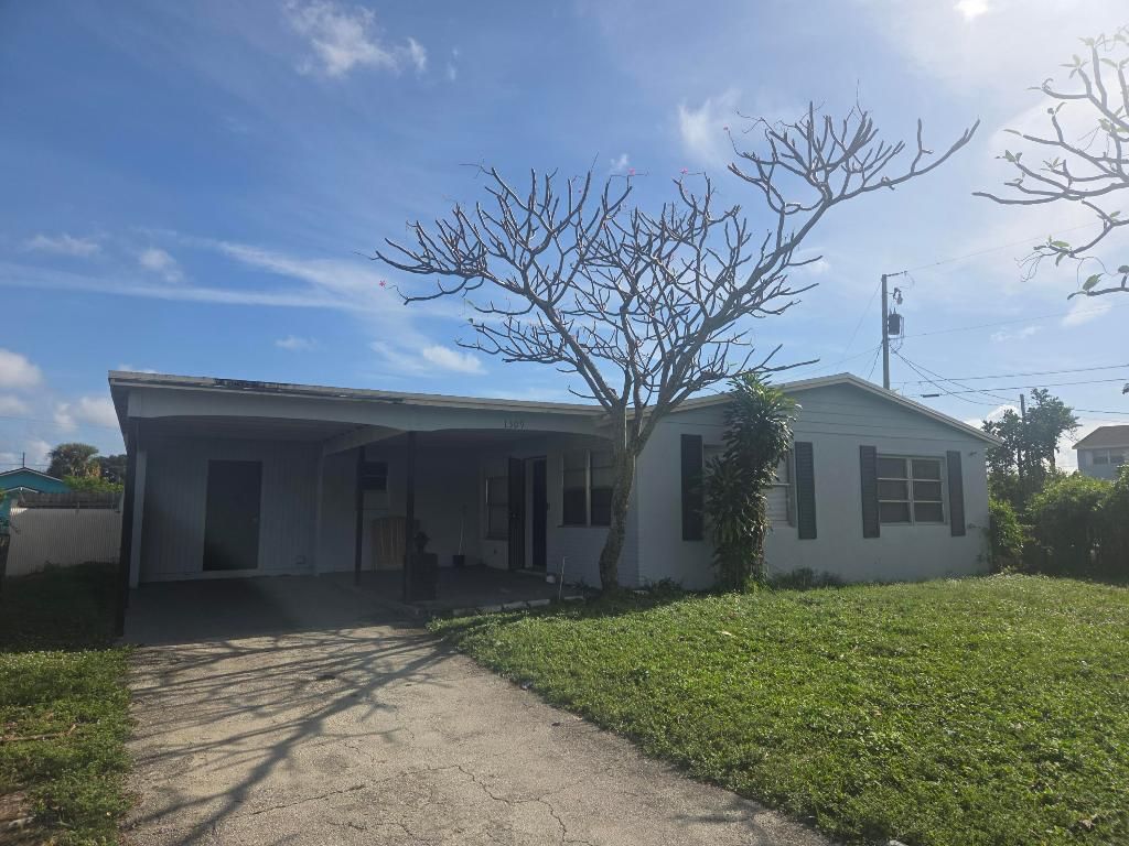 Photo of 1509 S 24th Court, Riviera Beach, FL 33404 (MLS # R11150382)