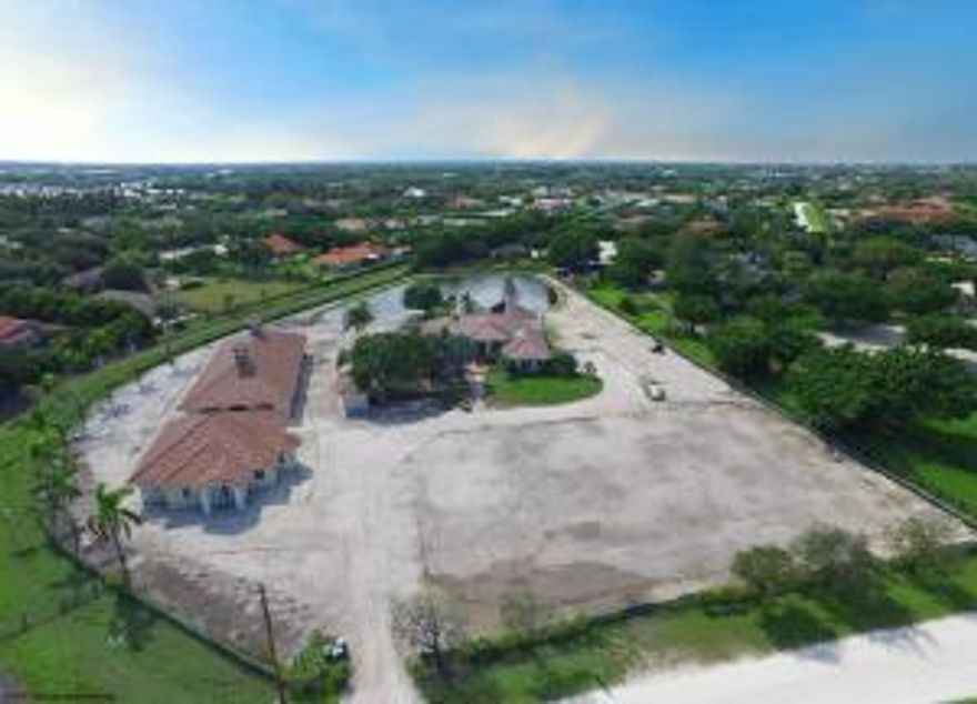 LOCATION, LOCATION, LOCATION! 3.6 ACRE HORSE FARM IN SADDLE TRAIL PARK ON THE SOUTH SIDE OF GREENBRIAR - DIRECTLY ACROSS FROM WEF. ON THE BRIDLE PATH - 3 MINUTE HACK TO PIERSON HORSE CROSSING. BEING SOLD ''AS-IS''. THE STABLE & DETACHED GROOMS QTR'S ARE BUILT BUT JUST NEED THE FINISH WORK COMPLETED. THE RIDING ARENA SPACE HAS BEEN PREPED FOR THE INSTALLATION, CHOOSE THE FOOTING YOU DESIRE.  THE BARN IS A CENTER AISLE WITH A CROSS AISLE WITH 14 STALLS (ALL 14'X12') WITH TACK ROOM & TWO WASH RACKS. ADJACENT TO THE BARN ARE TWO MORE WASH/GROOMING STALLS WITH LAUNDRY FACILITIES, FEED & HAY STORAGE.  THE GROOMS QTR'S IS 3BR/2BTH WITH FULL KITCHEN, LIVING ROOM & EAT-IN AREA. ONE BATHROOM IN THE GROOMS QTRS HAS A SEPERATE SHOWER & ROMAN TUB AND THE OTHER A SHOWER STALL.  THE HOME NEEDS UPDATING.