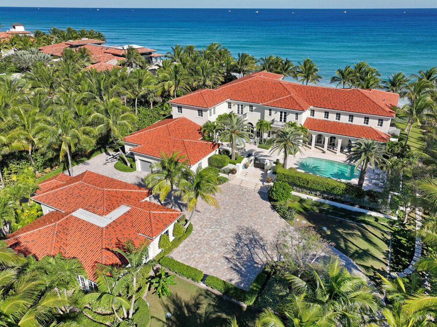 Villa Oceano Azul – 1400 South Ocean Blvd, Manalapan, Florida 33462. As this ocean to intracoastal majestic estates name implies is a contemporary South Florida ultra-luxury waterfront real estate masterpiece created to impress with infinite blue ocean views perfectly set on almost two acres in Palm Beach County's grandest Gold Coast city of Manalapan. An awe-inspiring beachfront entertainer's paradise flawlessly designed by award winning Marc-Michaels Interior Design and offered completely furnished with well-appointed finishes that suggest an unequaled presence of elegance and opulence. Indulge in a sophisticated ambiance of luxury and grandeur as this stylish oceanfront residence is acclimated to a diversity of today's lifestyle desires boasting unparalleled resort inspired comforts. Villa Oceano Azul - 1400 South Ocean Blvd, Manalapan, Florida 33462. As this ocean to intracoastal majestic estates name implies is a contemporary South Florida ultra-luxury waterfront real estate masterpiece created to impress with infinite blue ocean views perfectly set on almost two acres within Palm Beach County's grandest Gold Coast city of Manalapan. An awe-inspiring beachfront entertainer's paradise flawlessly designed by award winning Marc-Michaels Interior Design and offered completely furnished with well-appointed finishes that suggest an unequaled presence of elegance and opulence. Indulge in a sophisticated ambiance of luxury and grandeur as this stylish oceanfront residence is acclimated to a diversity of today's lifestyle desires boasting unparalleled resort inspired comforts.

Tour room after stunning room that each showcase first-class design elements fashioned for the world's most discerning home buyers each boasting dazzling water views of either the Gold Coasts' shimmering Atlantic Ocean or the tranquil Intracoastal Waterway. Sculpted grounds adorn twin pools; the residences backyard alfresco entertaining areas east pool is framed by panoramic ocean vistas and the open-air arrival courtyard's west pool looks onto your own private fifty-foot dock replete with boat lift to accommodate a twenty-thousand-pound vessel. Across the expansive motor court is a 1,200 square foot one bedroom Guest House finished with a spacious Living Room, Kitchen and two Baths. 

Capacious room dimensions include a 46 x 24 foot Owners' Suite, a 44 x 27 foot Club Room, a 23 x 22 foot Formal Living Room and 30 x 24 foot Family Room.