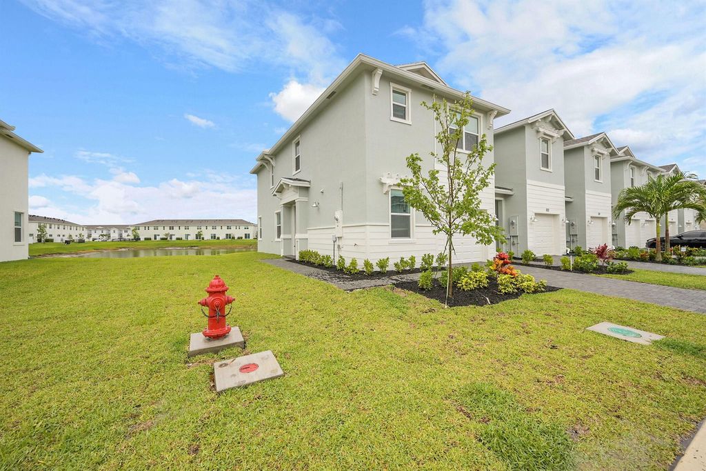 Photo of 520 SE Rivergrass Street, Port Saint Lucie, FL 34984 (MLS # R11098633)