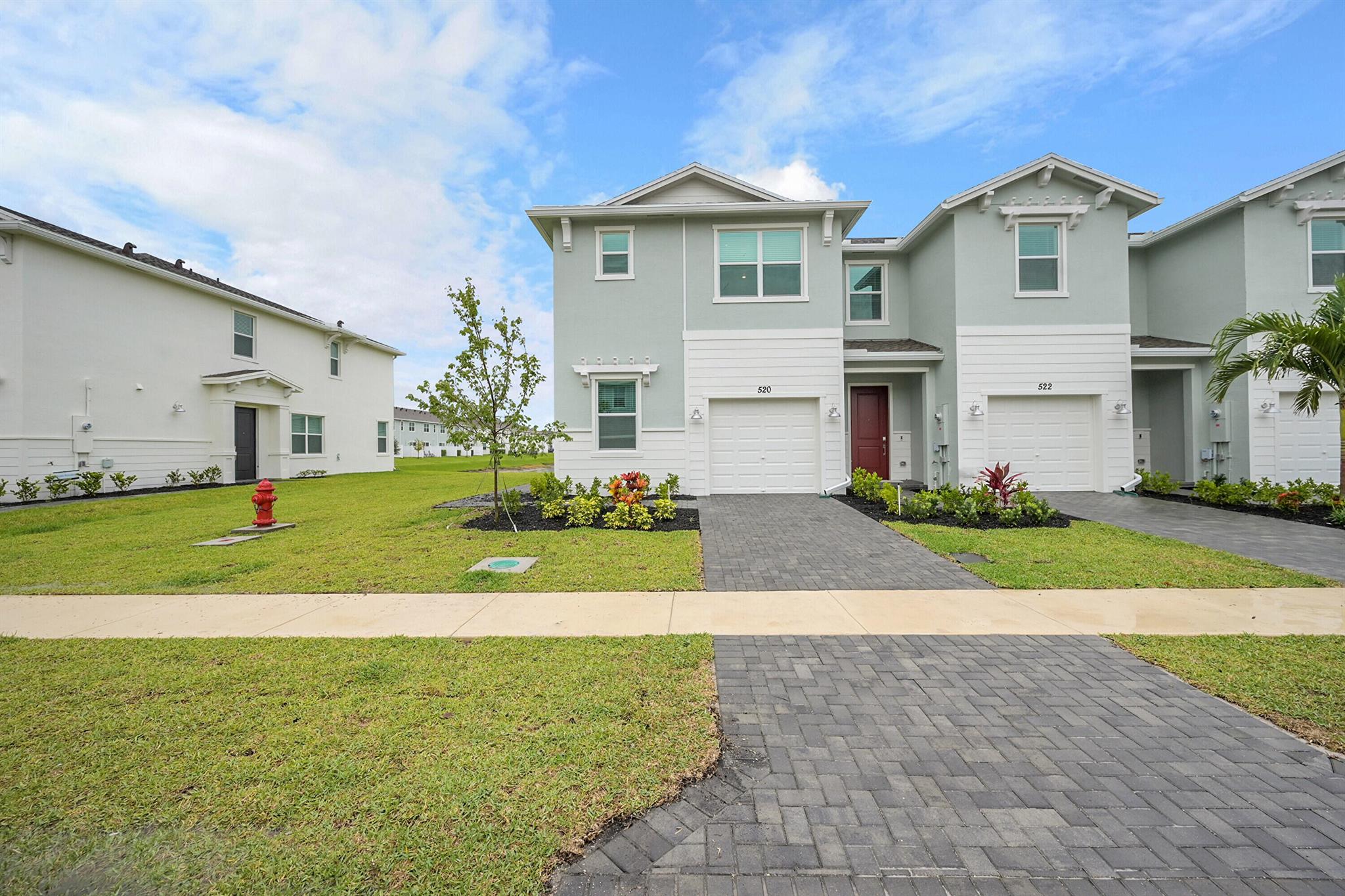 This two-story townhome showcases a contemporary open design among the first-floor kitchen, dining room and living room to promote seamless transitions between spaces. Through sliding glass doors is a terrace for outdoor relaxation. Upstairs caters to all three bedrooms, including the spacious owner's suite complemented by an adjoining bathroom and oversized walk-in closet. Prices, dimensions and features may vary and are subject to change.