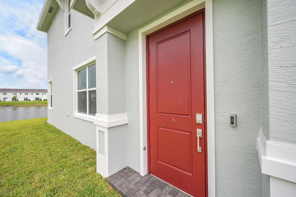 Photo of 520 SE Rivergrass Street, Port Saint Lucie, FL 34984 (MLS # R11098633)